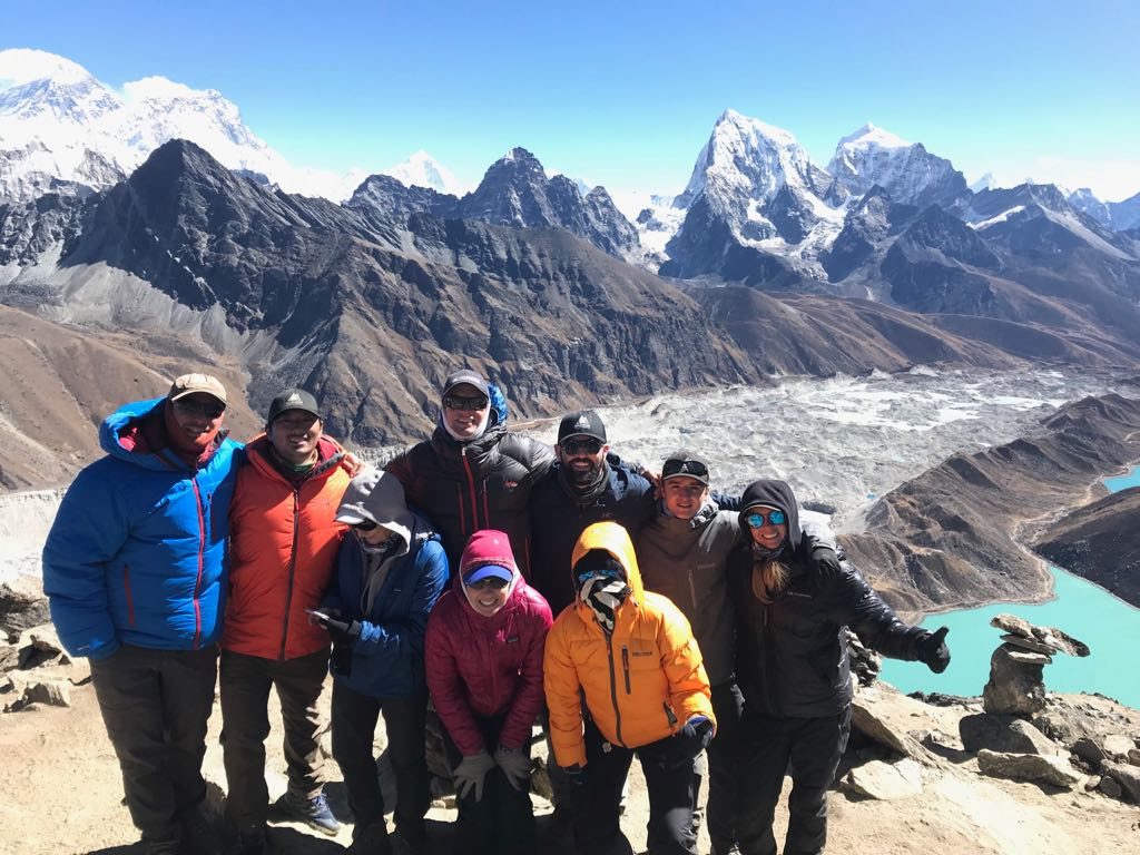 The team at the top of Gokyo Ri (17,800 ft) today, beautiful views all around! Everest is behind top left.
