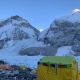 Photo of Everest Base Camp with a nearly full Moon above the Western Cwm