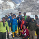 A toast to a safe climb at our base camp with the Khumbu Icefall behind
