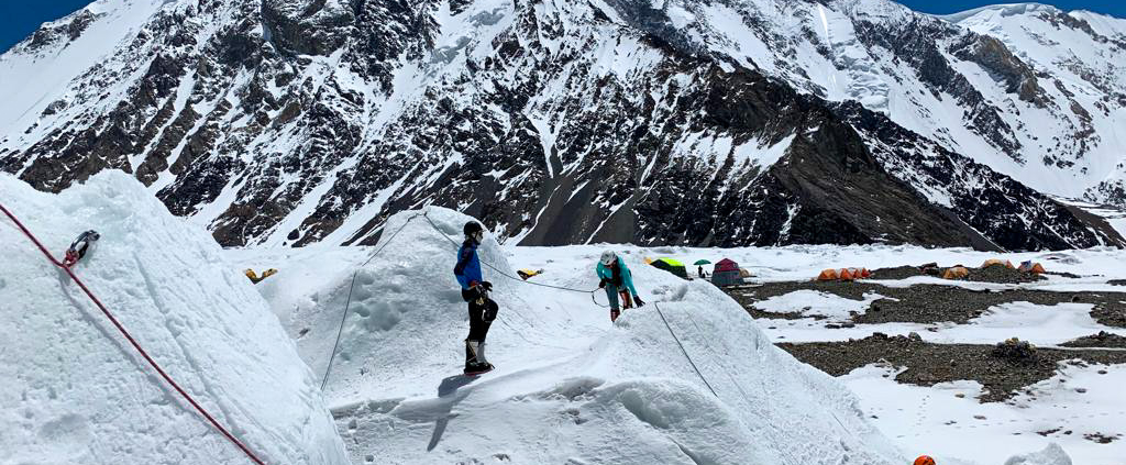 Training in K2 base camp with Broad Peak behind