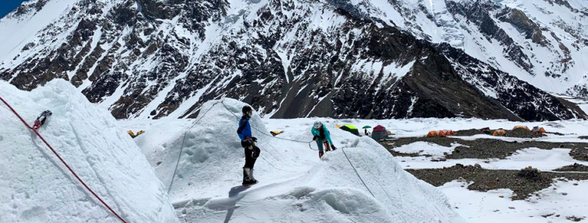 Training in K2 base camp with Broad Peak behind
