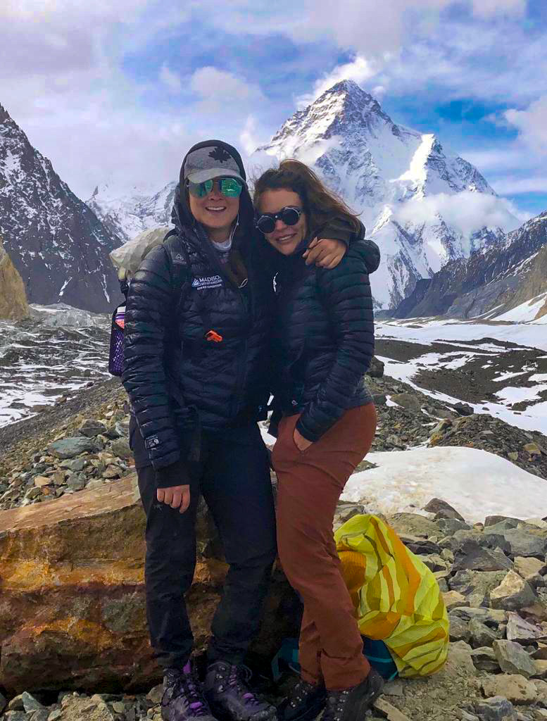 Climbers Elizabeth and Gina with K2 behind