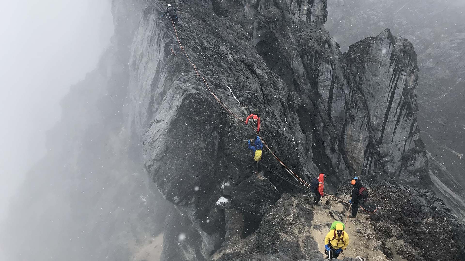 Climbers on the summit ridge of Carstensz Pyramid in Indonesia