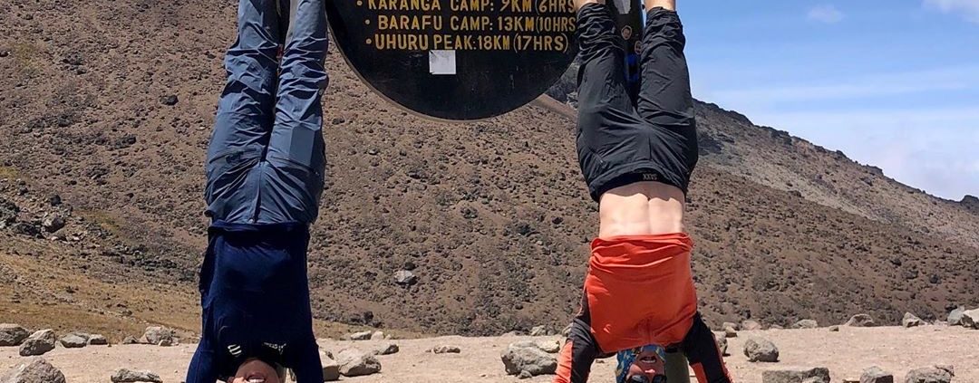 Celebrating arrival at the Lava Tower on Kilimanjaro with headstands!