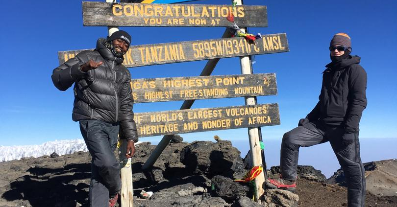 Climbers on the summit of Kilimanjaro