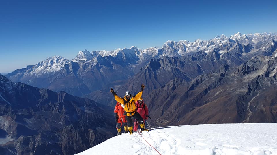 Jenn D. topping out on Ama Dablam