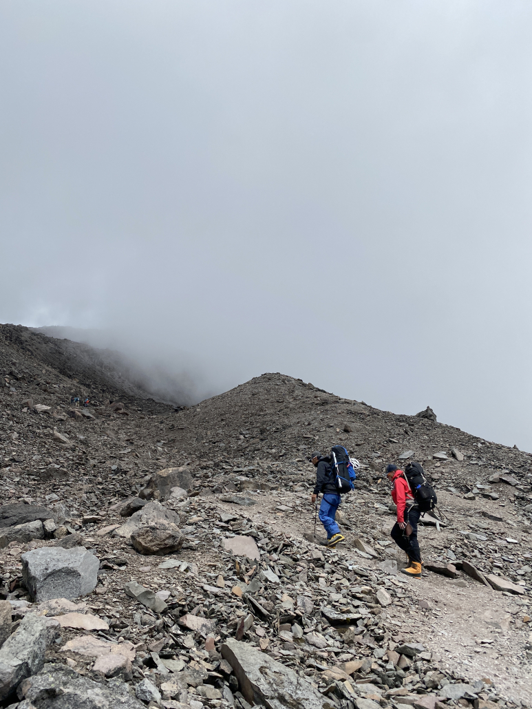 Climbers hiking to Chimborazo's high camp