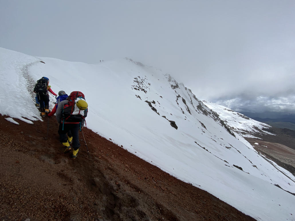 Climbers transitioning on to snow before reaching Chimborazo's high camp