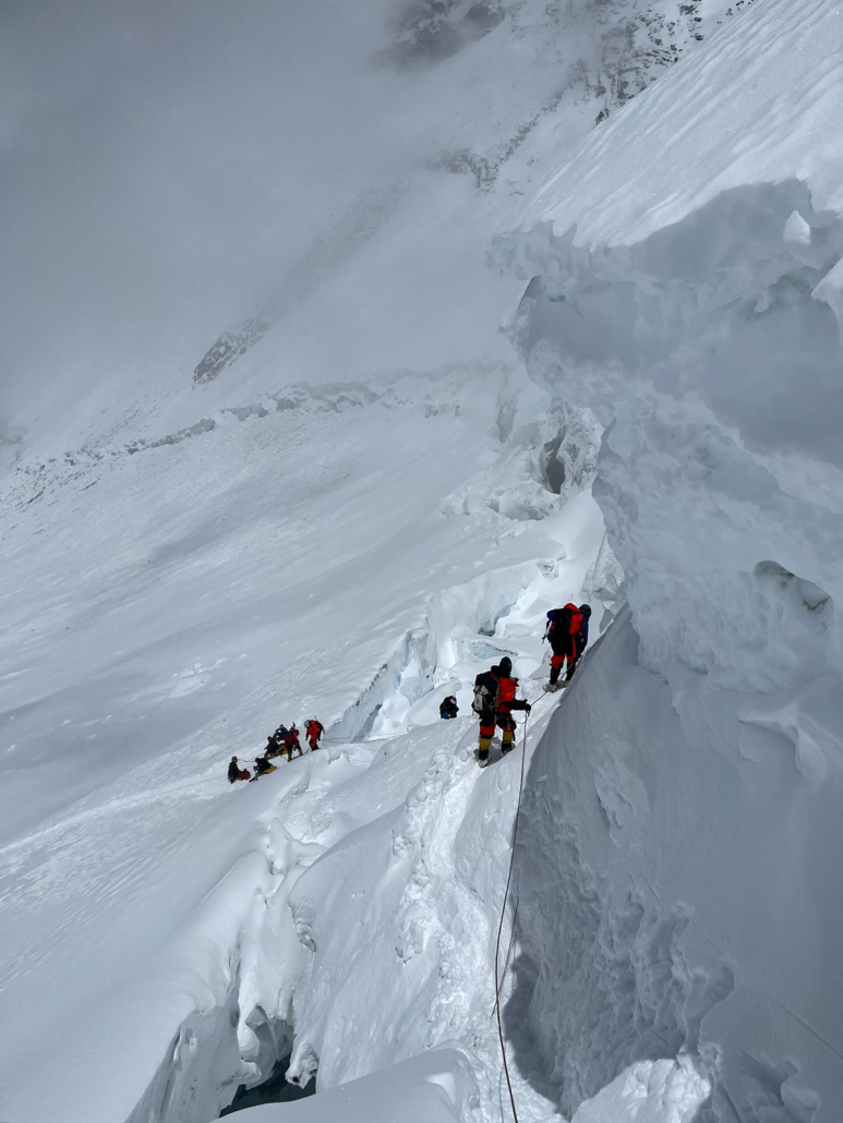 Climbing under the bergschrund at the base of the Lhotse Face