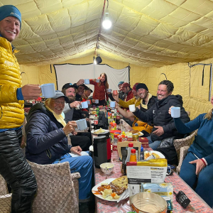 The team toasting the summit success at Everest Base Camp. Cheers!