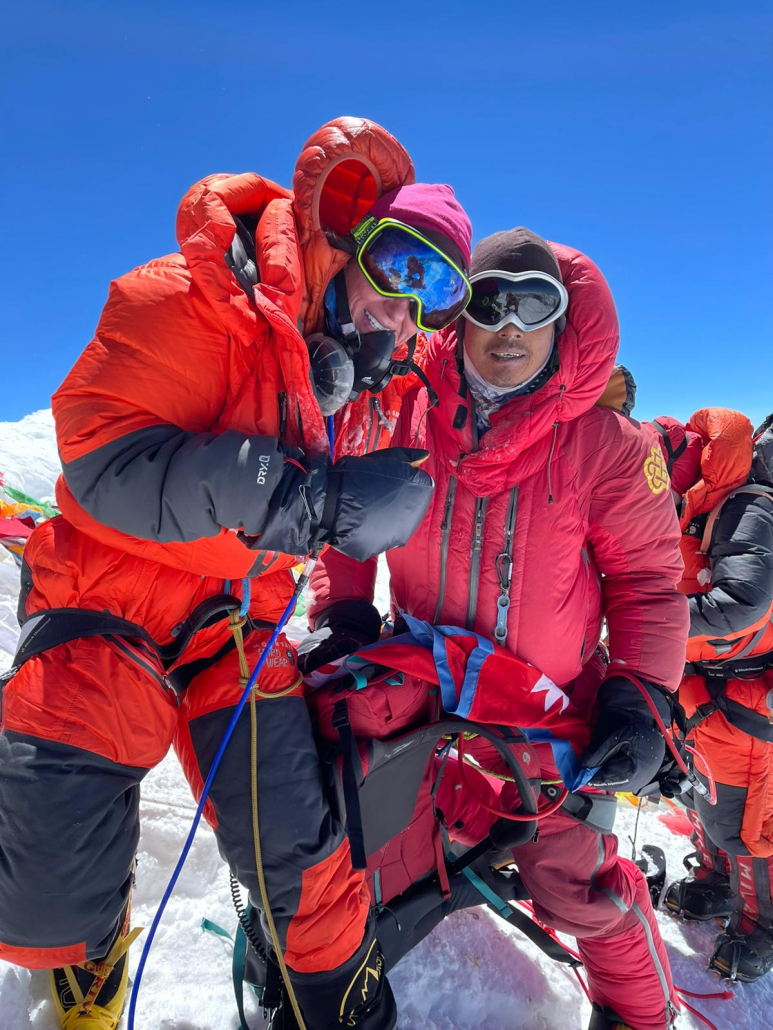 Kristin B and climbing sherpa Mingmar at the top of the world