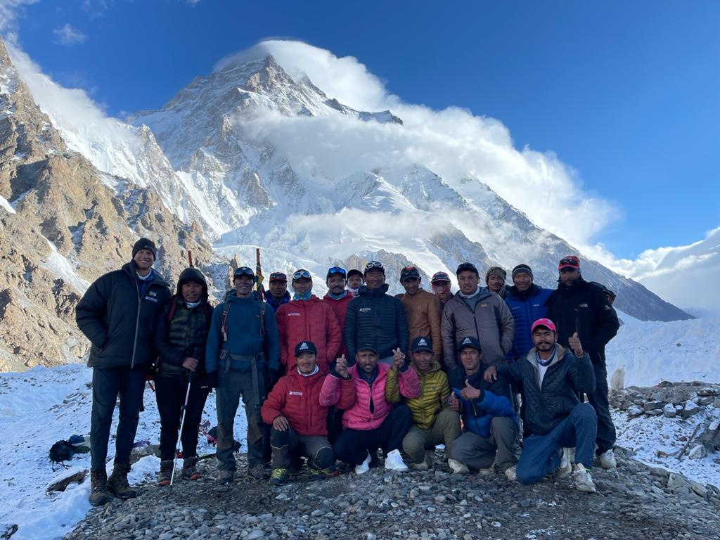 Garrett with Sherpa and Pakistani crew departing K2 base camp