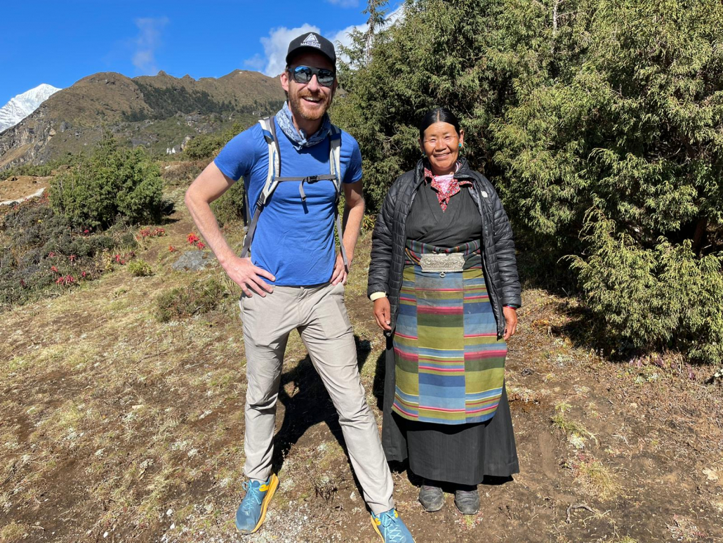 Climber J.B. Waterman poses with local Sherpa woman above Namche