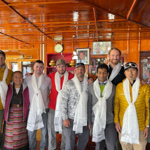 The 2021 Ama Dablam team receives blessings as they depart Namche and the Panorama Lodge
