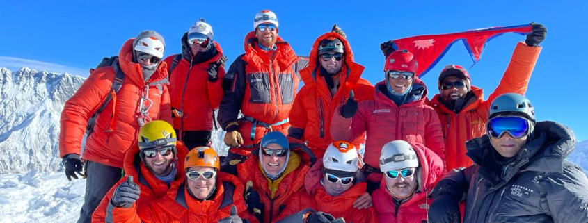 2021 Madison Mountaineering team and friends on the summit of Ama Dablam