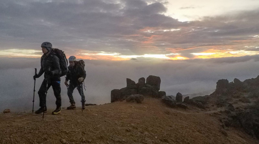 Climbers Carter B. and Saskia J. nearing the summit of Illiniza Norte