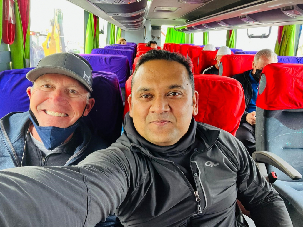 Ed Viesturs and Quazi R. on the bus to the Punta Arenas airport (2022.01.05 Vinson)
