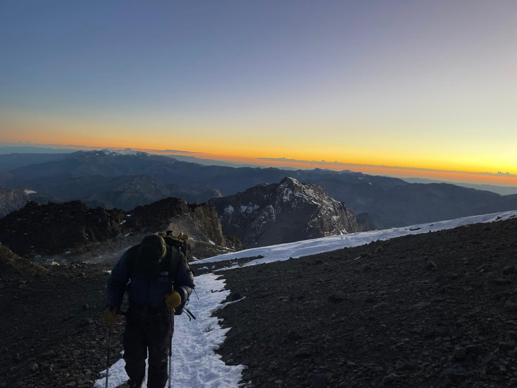 Climbing to the top of Aconcagua at sunrise