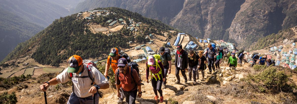 Guide Cacho Beiza leading the group above Namche.