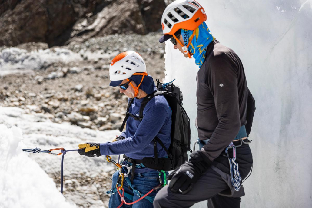 Expedition Leader Garrett Madison working with climber Piers B. during a skills refresher session on June 28. The ice pinnacles on the Godwin Austen Glacier next to base camp are a great venue for reviewing fixed line climbing techniques. (📸: @terray_s)