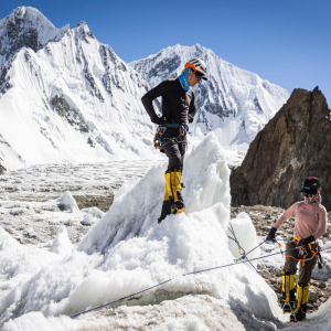 Garrett and Nelly reviewing climbing techniques nearby K2 base camp