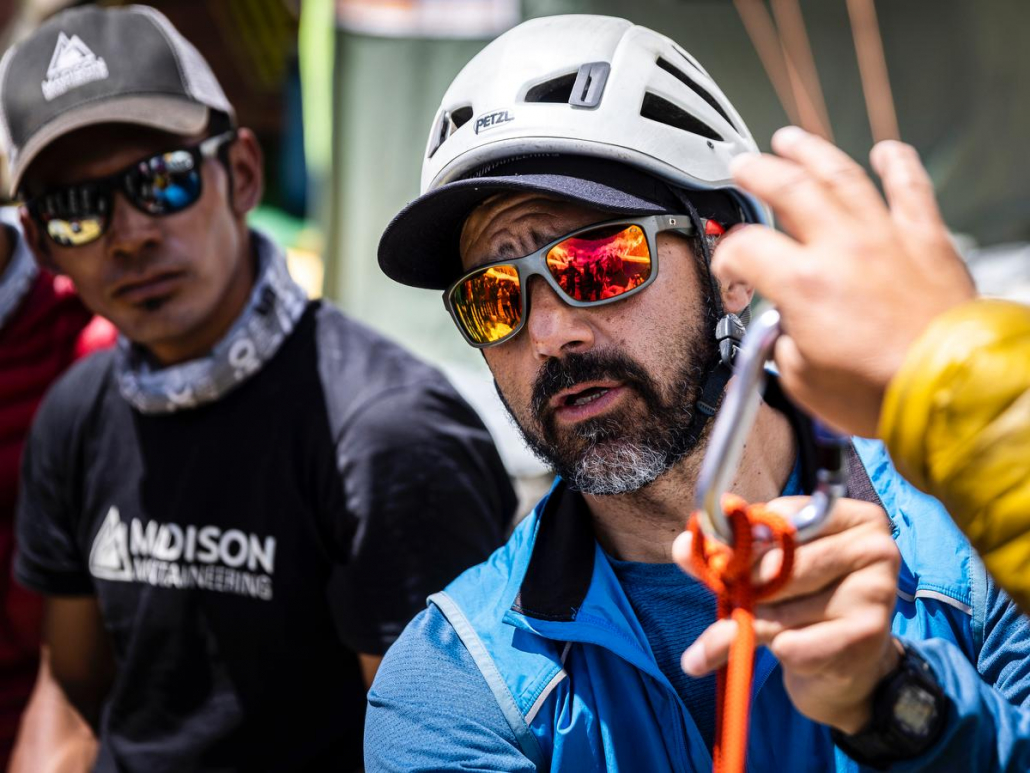 Guide, Cacho Beiza, discussing technical and rescue skills during a refresher session with our sherpa and Balti staff in base camp today (📸: @terray_s)