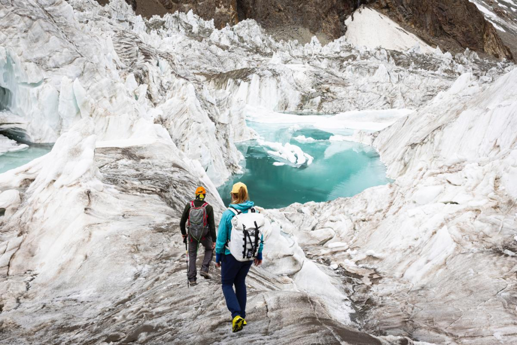 Guide, Cacho Beiza walking with our climber, Krisli, on the Savoia Glacier yesterday, July 9th (📸: @terray_s).