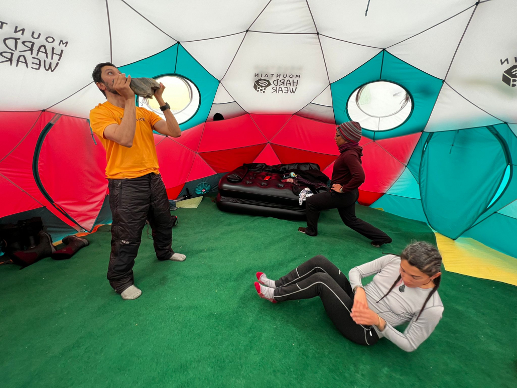 An exercise session lead by Nelly Attar in our Mountain Hardwear Space Station Dome. 