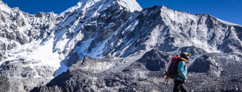Our climber, Krisli, acclimatizing above base camp with Ama Dablam in the background. Photo pulled from Madison Mountaineering archive. Photo: Terray Sylvester