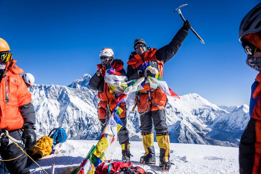 Garrett Madison and Aang Phurba Sherpa on the summit! Photo: Terray Sylvester