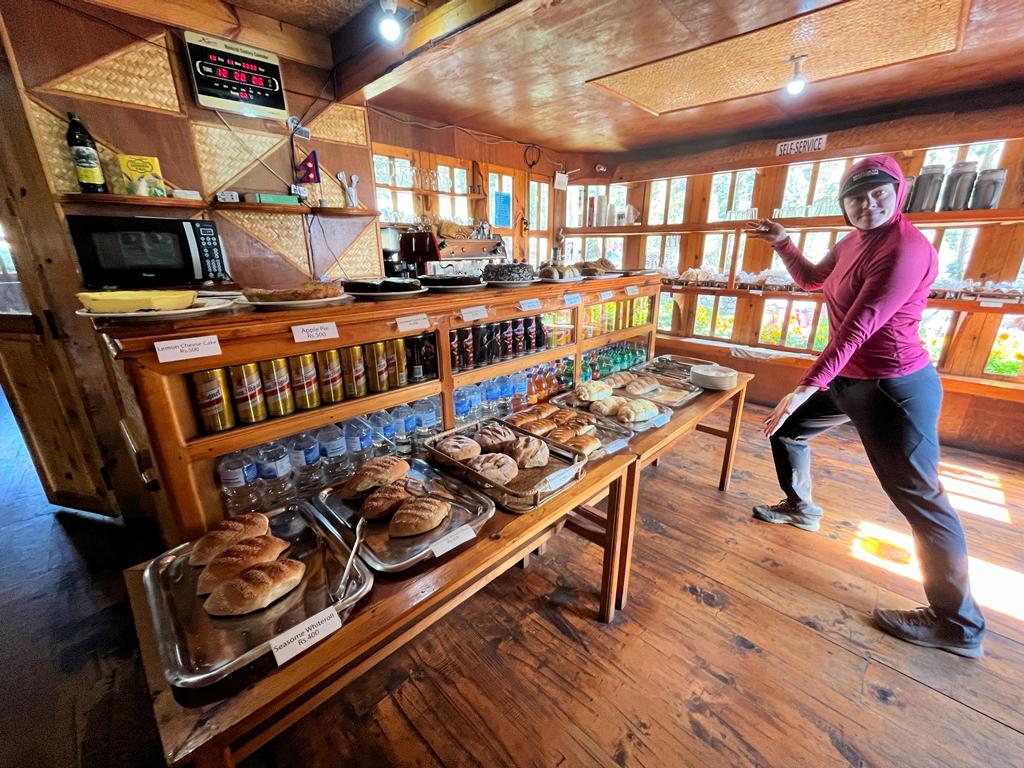 Guide, Hannah Smith in the excellent bakery in Phakding while trekking out from base camp!