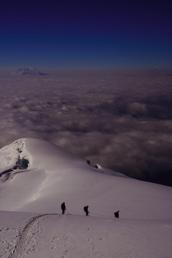 The team descending Cayambe after a safe and successful summit!