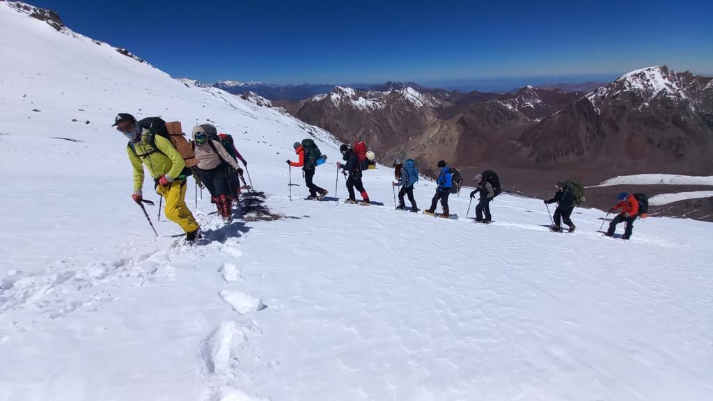 The team during their summit push under blue skies on Aconcagua!