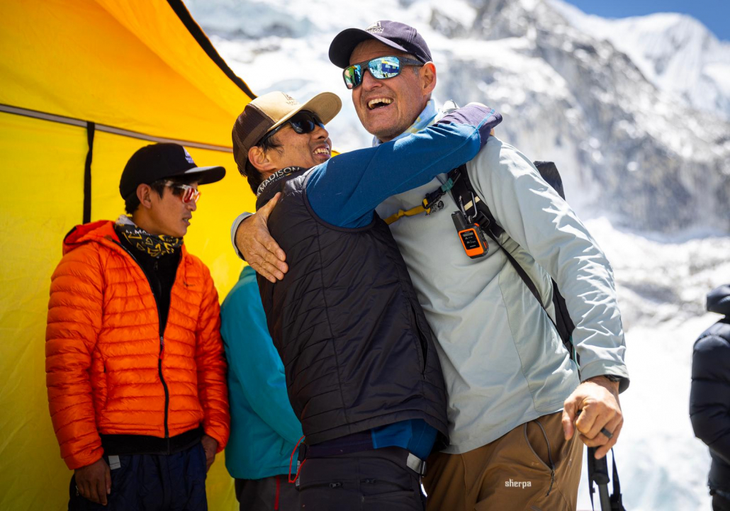 Climber, Rick Irvine receiving a warm welcome to base camp from sirdar and guide, Aang Phurba Sherpa! (Photo: Terray Sylvester)