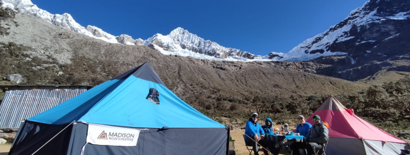 The team enjoying Alpamayo base camp under beautiful, clear-blue skies!
