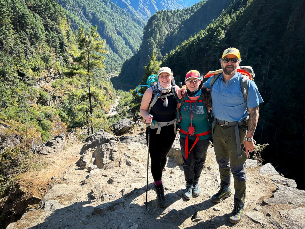 Madison Mountaineering expedition team members Kristen, Kim and Max approaching Namche Bazaar (Photo by Terray Sylvester)