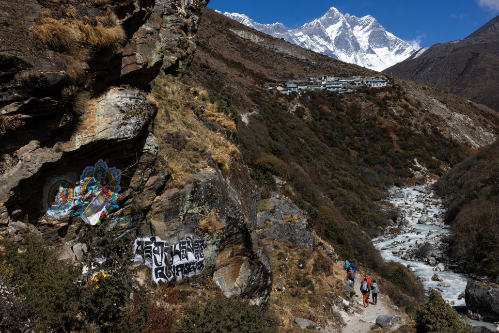 Our Everest Base Camp trekking team approaching Shomare with Lhotse in the background (Photo by Terray Sylvester)