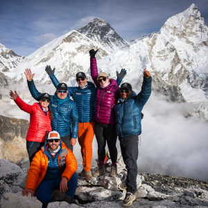 The team topping out on Kala Patthar with excellent views of Mount Everest (Photo by Terray Sylvester)
