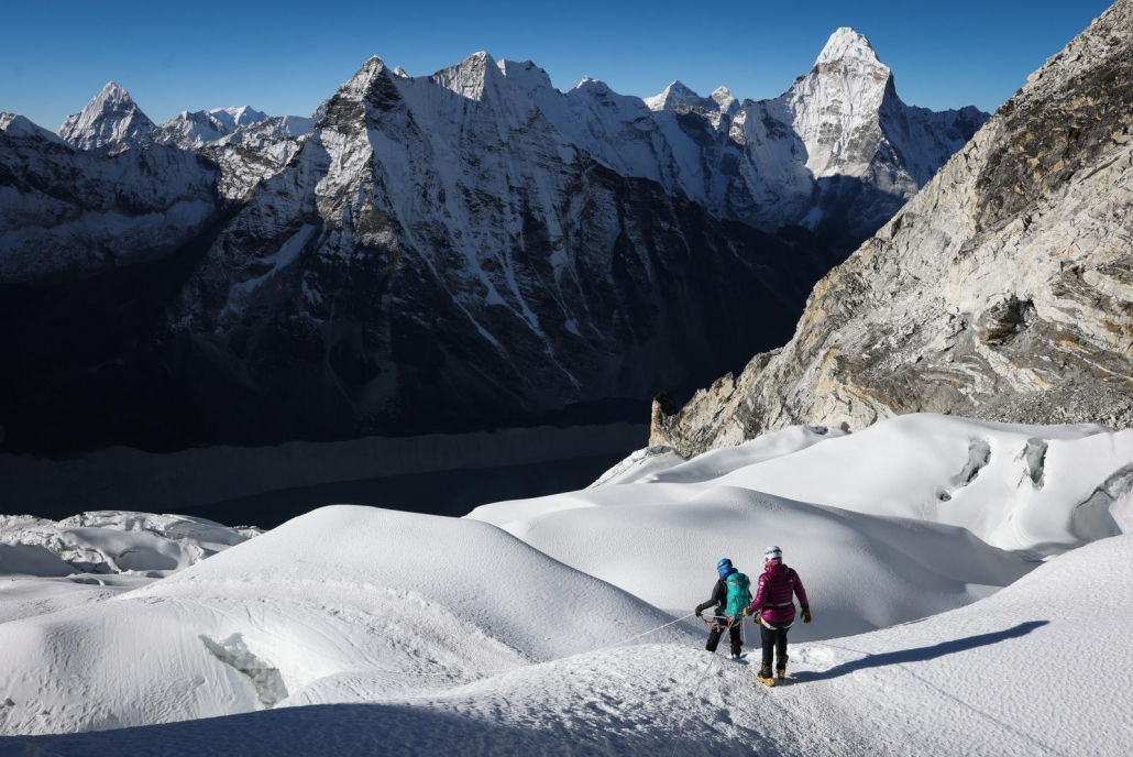 Descending toward base camp with Ama Dablam and other peaks in the distance (Photo by Terray Sylvester)