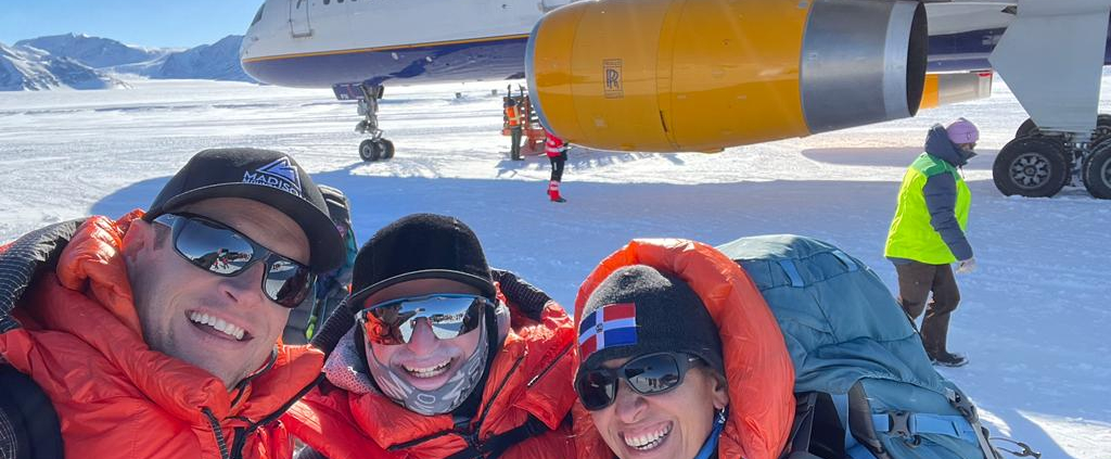 Guides, Garrett and Benny with Mount Vinson climber, Thais after landing on the ice!