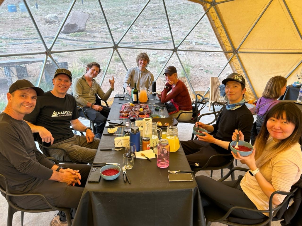 Sitting down for a meal in one of our dome tents in base camp!