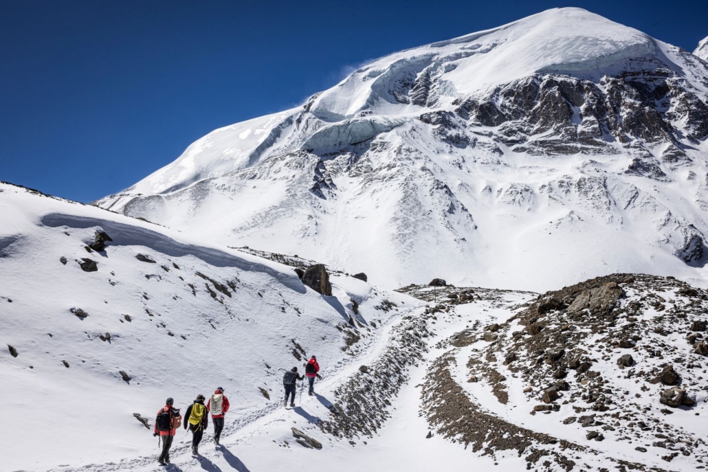 The team ascending the Thorung La. (Photo by Terray Sylvester)