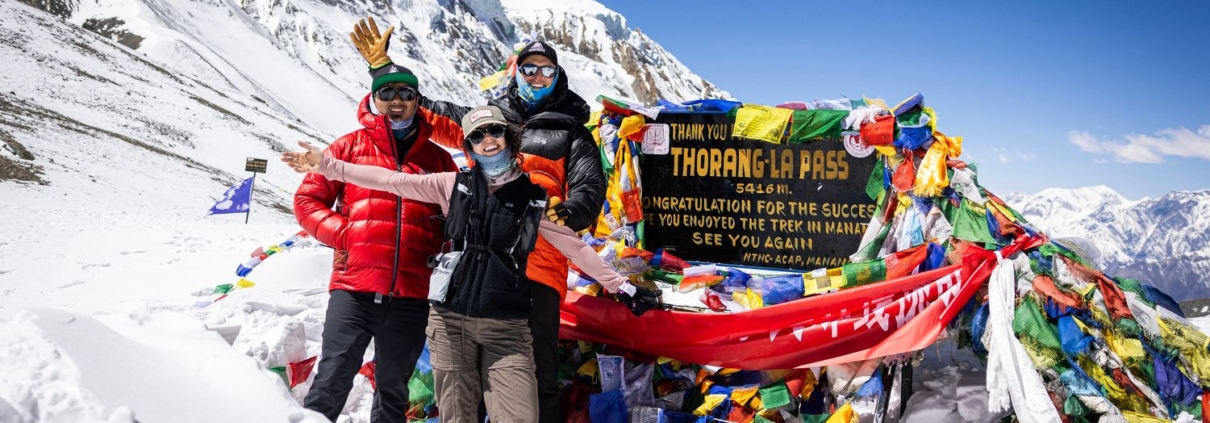 Sirdar and guide Aang Phurba Sherpa, climber Nelly Attar, and guide Terray Sylvester on the Thorang La. (Photo by Tenzi Sherpa)