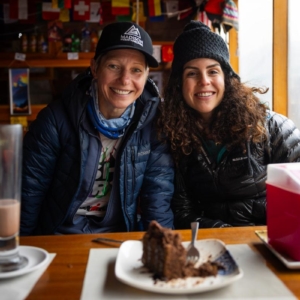 Climber Nelly Attar with Madison Mountaineering Everest Base Camp trekker & Lobuche East climber Jeannette Glass in the famous bakery at Lobuche Village! (Photo by Terray Sylvester)