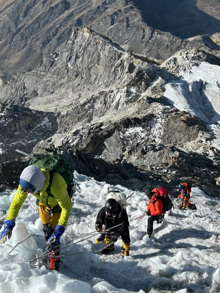 The Madison Mountaineering team ascending fixed lines toward the summit of Lobuche East!
