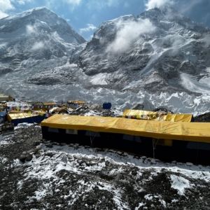 The Madison Mountaineering base camp with a dusting of snow beneath Mount Everest and Nuptse.