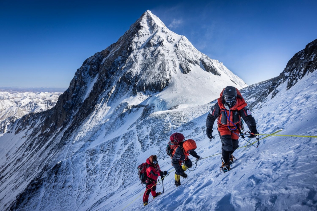 The team approaching the base of the Lhotse Couloir with Mount Everest in the background (Photo by Terray Sylvester)