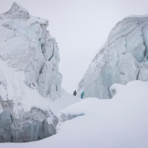 Two of our team members amid dramatic scenery above Camp 1. (Photo by Terray Sylvester)