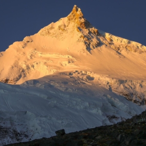 Morning light on Manaslu’s East Pinnacle, which towers over base camp. (Photo by Terray Sylvester)