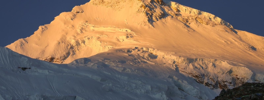 Morning light on Manaslu’s East Pinnacle, which towers over base camp. (Photo by Terray Sylvester)